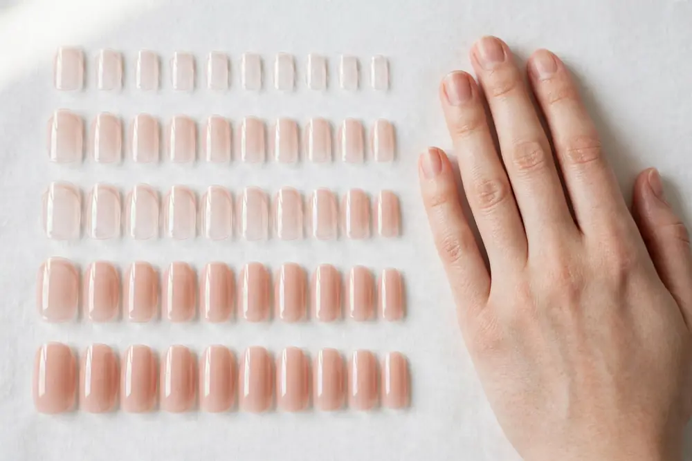 Sizing press on nails to match each fingertip